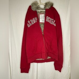 fluffy woman’s Aeropostale zip-up jacket